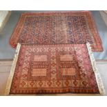 A Northwest Persian Woollen Rug with an all over design upon a blue red and cream ground within