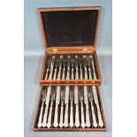 A Cased Set of Twelve Silver Handled Dessert Knives and Forks with Silver Kings Pattern Handles
