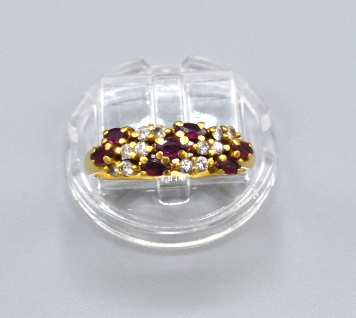 A 18ct Yellow Gold Diamond and Ruby Ring set with three rows of rubies interspersed with diamonds, - Image 2 of 2