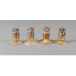 A Set of Four Edwardian Silver Menu Holders in the form of Owls, Chester 1908, makers Sampson Mordan