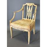 A Regency Painted Armchair with a splat back above an upholstered seat raised upon tapering legs