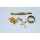 A 9ct. Gold Bar Brooch with Solitaire Diamond together with a 9ct. gold crucifix, a band ring and