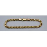 A 9ct. Gold Interwoven Linked Bracelet, 14.7 gms