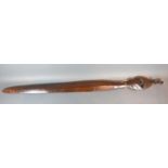 An Oceanic Carved Wooden Club Spear 117 cms long