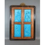 A Chinese Panel Inset with four blue glazed porcelain panels 58cm x 43cm