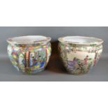 A Pair of 20th Century Chinese Fish Bowls, each decorated in polychrome enamels and highlighted with