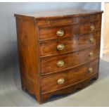A 19th Century Mahogany Bow Fronted Chest of two short and three long graduated drawers with oval