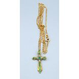 A 9ct. Gold Pendant in the form of a Crucifix set with emeralds and diamonds, 1.3 gms, together with