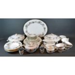 A Royal Worcester June Garland Pattern Part Tea and Dinner Service comprising tureens, platters,