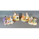 A German Porcelain Group depicting Figures Around a Table decorated in polychrome enamels and