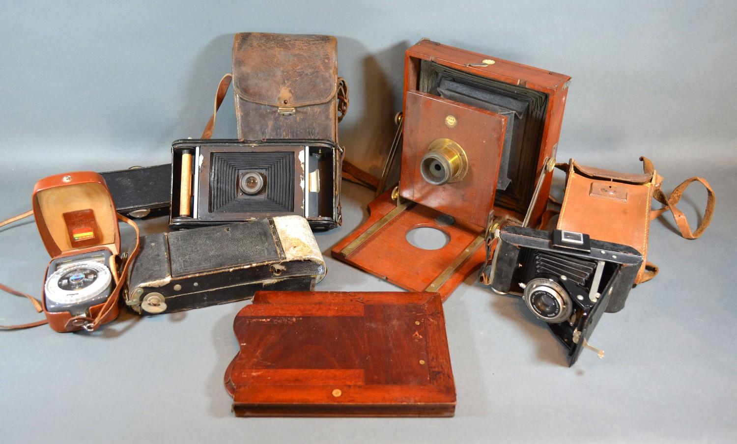 A 19th Century Mahogany Plate Camera 'The Blackfriars' together with various other early cameras