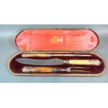 A Sheffield Silver and Bone Handled Three Piece Carving Set within fitted lined case by the