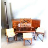 A Mahogany Bow Fronted Three Drawer Bedside Chest together with a collection of other items to
