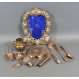 A London Silver Photograph Frame of Shaped Outline decorated whispers together with other items of
