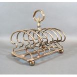 A Victorian Silver Six Division Toast Rack of Shaped Form with Handle, London 1849, maker R&S
