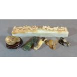 A Chinese Jade Scroll Weight 19cm long together with five Chinese small carvings