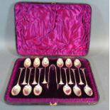 A Set of Twelve Victorian Silver Tea Spoons with matching tongs within fitted lined case