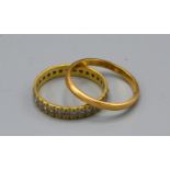 An 18ct. Gold Wedding Band, 2.2 gms together with an 18ct. gold diamond eternity ring, 2.5 gms