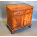 A 20th Century Mahogany Serpentine Side Cabinet with two drawers above two doors raised upon bracket