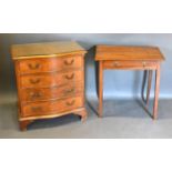 A 20th Century Burr Walnut Serpentine Chest of four long drawers with brass handles raised upon