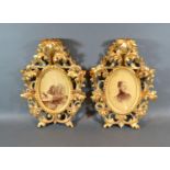 A Pair of Late 19th Early 20th Century Gilt Wood Oval Picture Frames of Rocco form with pierced