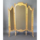 A Late 19th Early 20th Century French Gilded Three Fold Screen with a bow carved cresting raised