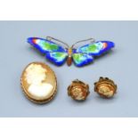 An Oval Cameo Brooch within 9ct. gold mount together with a pair of 9ct. gold cameo ear studs and