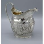 A George III Silver Jug of Embossed Form with Reeded Handle, London 1802, 4oz