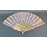 A Lace Fan backed with lilac satin with mother-of-pearl sticks and guards with gilded monogram