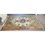 A North West Persian Woollen Rug with a central medallion within an all-over design upon a blue,