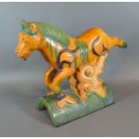 A Chinese Roof Tile in the form of a Tang Horse 32cm long