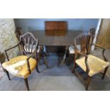 A Reproduction Mahogany Twin End Dining Table with extra leaf together with a set of three 19th