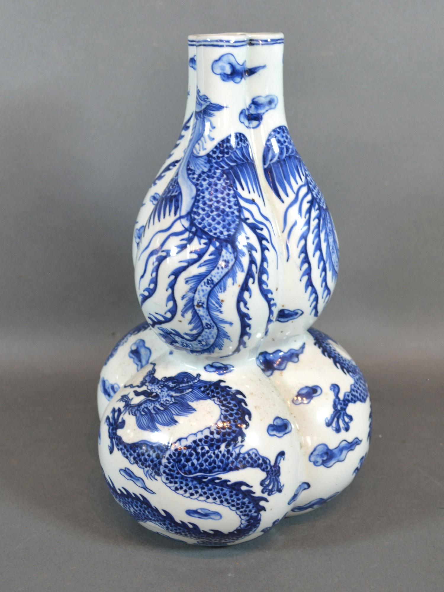 A 19th Century Chinese Porcelain Gourd Vase of Triform decorated in underglaze blue with serpents, - Image 3 of 3