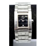 A Tissot Stainless Steel Cased Ladies Wristwatch with rectangular black dial and linked stainless