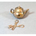 A Queen Anne Miniature Silver Model in the form of a Teapot, London 1711, maker's mark MA together