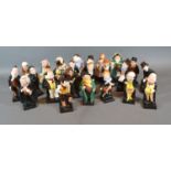 A Complete Set of Twenty Four Royal Doulton figures from the Charles Dickens series