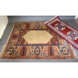 A North West Persian Woollen Rug, with a central medallion within an all-over design upon a cream,