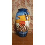 A Moorcroft Oviform Vase Reeds at Sunset Pattern tube lined 25cm tall