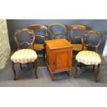 An Edwardian Satinwood Bedside Cabinet together with a pair of Victorian walnut side chairs and