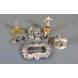 A 925 Silver Miniature Model of a Fisherman in a Rowing Boat together with other related items to