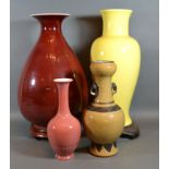 A 20th Century Chinese Red Glaze Oviform Vase with Hardwood Stand 38cm tall together with three