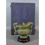A 20th Century Chinese Jade Model in the Form of a Jug with hardwood stand and original box 11cm