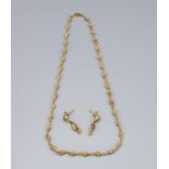A 9ct. Gold Necklace, the links in the form of shells, together with a pair of matching drop ear