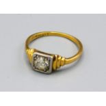 An 18ct. Gold Solitaire Diamond Ring approximately 0.40 ct. within a square setting, ring size P,