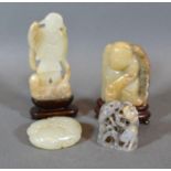 A Chinese Jade Carved Model in the Form of a Figure 8cm tall together with three other similar