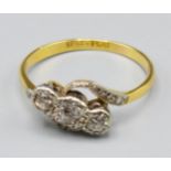 An 18ct Gold Three Stone Diamond Crossover Ring, 2.9 grams, ring size P