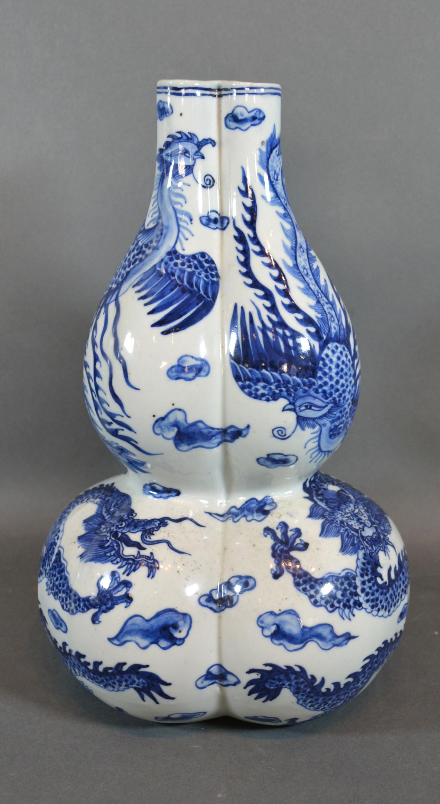 A 19th Century Chinese Porcelain Gourd Vase of Triform decorated in underglaze blue with serpents, - Image 2 of 6