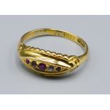 An 18ct Gold Dress Ring, set with red and white stones, 2.8 grams, ring size N