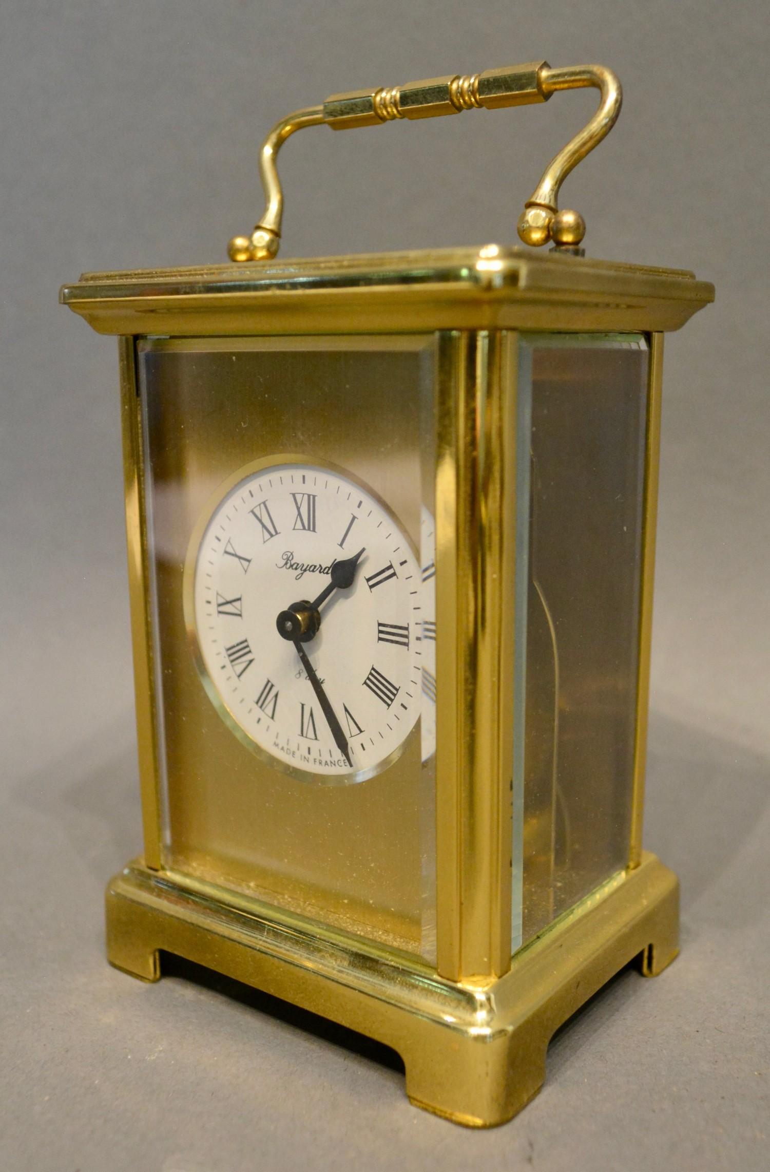 A Brass Cased Carriage Clock by Bayard, the enamel dial with Roman numerals and lever escapement