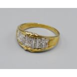 A 9ct Gold Diamond Band Ring of Pierced Form, 4 grams, ring size T